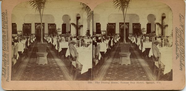 stereocard of empty dining room at TBH tables and chairs set for dinner