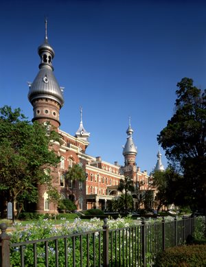 modern image of south end of Tampa Bay Hotel, clear sky, lush greenery