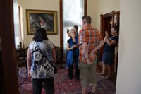 Historic Henry Plant Museum docent educating visitors during tour