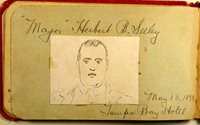 Album page with Major Herbert B Seeley's signature and a pasted in sketch. Sketch is of man's face. Text reads ""Major" Herbert B Seeley May 13 1898 Tampa Bay Hotel"