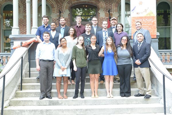 Contemporary - students from University of Tampa posing on the steps to Plant Museum