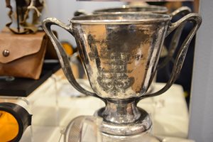 Engraved silver plated trophy with two handles: Consolation Prize Trophy awarded to Chas C. Weber, Tampa Bay Race January 4, 1913