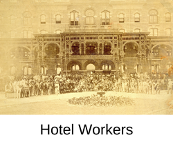 historic photo of large group of construction workers outside hotel