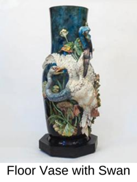 large floor vase with sculpted birds on the side