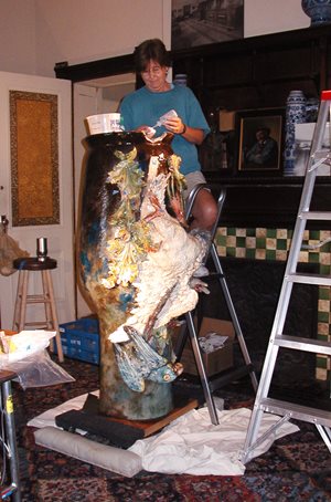 Claudia-cleaning-vase-copy.jpg Claudia-cleaning-vase-copy.jpg