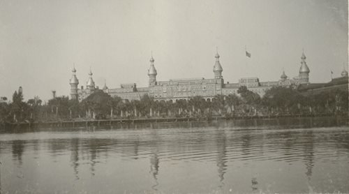 historic photo of hotel from across river
